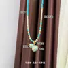 Original Elegante y Exquisito Collar de Cuatro Hojas de Trébol Calado de Colores Calabaza Piedra Natural con Cuentas Cadena de Suéter Simple de Alta Gama
