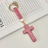 Llavero Colgante Cruz Tendencia Arcilla Suave Incrustaciones de Diamantes Cruz Simple Personalidad Lujo Ligero Encanto para Bolso Llavero de Coche