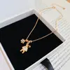 Collar de flor de circón bañado en oro real de 14k, cadena de clavícula estilo commuter exquisita, joyería de lujo ligero de alta gama para mujer al por mayor