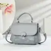 Bolsa pequena moderna para mulheres, novo modelo da primavera de 2026, bolsa quadrada pequena de ombro único e transversal, fresca e doce, versátil, moderna e simples