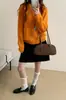 Suéter de tricô macio e confortável estilo coreano, com gola redonda e trança, para mulheres, peça de outer wear soltinha para outono/inverno 2026, top de tricô moderno