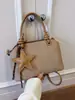 Bolso de mano retro transfronterizo para mujer, nuevo bolso de hombro simple de moda 2026, bolso cruzado versátil de nicho para el día a día