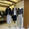 Conjunto de Duas Peças Estilo Coreano Treze Fileiras sum* Outono 2026: Um top de camiseta pulôver estiloso e bem desenhado para mulheres
