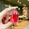 Nueva taza flash iceberg botella de arena movediza con aceite decoración llavero colgante pequeña joyería caja ciega regalo de bienestar venta al por mayor
