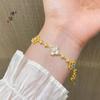 O Mesmo Estilo de Ouro Areia com Incrustações de Diamantes e Madrepérola Rosa da Loja de Ouro Puzuo é uma Pulseira Recortada de Alta Qualidade Versátil para Sua Namorada