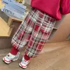 Pantalones de cuadros para niña con forro polar 2026 Nuevo estilo Moda infantil Elegantes para niña Pantalones casuales engrosados Estilo Otoño/Invierno