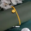 Pulsera de Campana con Cara de Animal Pulsera Dorada Pez de Madera Mágico Pulsera Guardián de la Paz Accesorios de Oro Arena Vietnamita Femeninos Joyería de Mano