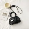 Nova Bolsa de Mão Estilo Coreano Doce e Simples com Formato de Concha Versátil da Moda de Alta Qualidade para o Trabalho e Uso Casual com Alça de Ombro e Transversal