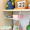 Venta al por mayor del fabricante Cesta colgante para gabinetes de cocina del hogar Cesta colgante universal de arte en hierro para almacenamiento Estante de almacenamiento colgante debajo del gabinete