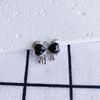 Accesorios de joyería DIY simple sentido de alta gama micro lujo colgante de collar con lazo incrustado de circón pendientes Colgante de joyería