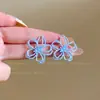 Brincos de Flores Vazadas Doces de Primavera: Simples, Elegante, Fresco, Sofisticado, Luxuoso, Único e Versátil