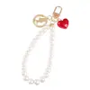 Nuevo Pulsera Creativa de Perlas, Llavero Colgante Lindo de Corazón de Melocotón de Aleación, Accesorio Metálico de Cabeza de Belleza, Bolso Decorativo para Mujer