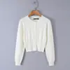 Otoño 26 cárdigan de punto básico liso de manga larga con cuello redondo estilo francés + conjunto de suéter casual ajustado + minifalda ceñida