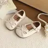 Zapatos de piel para niños 2026 primavera y otoño nuevos estilo coreano versátiles zapatos de princesa con lazo para niñas con suelas suaves y ribete de encaje