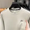 Sudadera de aire de manga larga con cuello redondo para otoño para hombre, nuevo estilo 2026, suave y cómoda, capa base cálida para hombre