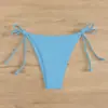 Nuevos Sexy 2026 Triángulo Aguas Termales Color Sólido Estilo Europeo y Americano Bañador para Hombre Venta al por Mayor Transfronterizo Atado Traje de Baño de Playa Bikini para Mujer