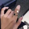 Anillo Abierto Hecho a Mano de Cuadros Blanco y Negro de Moda Sencillo con Goteo de Aceite Anillo Distintivo para Estudiantes Femeninas Geométrico Nuevo Producto Nicho
