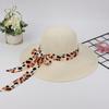 Sombrero de playa de ala ancha estilo coreano con lazo y protección solar, ideal para verano.