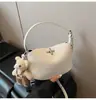Bolsas Mais Vendidas de 2025 Estilo Simples Feminino Bolsa de Mão Cor Sólida Feminina Casual Toque de Luxo Bolsa Lancheira Bolsa Transversal Estilosa