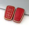 Adecuado para coche Toyota corona Carolina Camry borde dorado coche TPU pegamento flexible funda de llave todo incluido para mujer