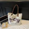 Bolsa de Lona Estilo Coreano Ins Desenho Animado para Mulheres 2026 Nova Grande Capacidade Estudante Aula Deslocamento Versátil Bolsa de Ombro Tote