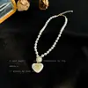 Colar de Pérolas com Laço Cravejado de Diamantes Estilo Francês Nicho Luxo Leve Moda de Alta Qualidade Acessório de Colar Versátil Joias