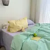 ¡Estilo blogger! Juego de cuatro piezas de algodón puro lavado con bloques de color, sábana a rayas, juego de decoración suave de tres piezas para dormitorio estudiantil