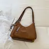 Mochila de Felpa de Gamuza Súper Caliente para Mujer 2026 Nueva de Gran Capacidad Bolso de Hombro Retro Mate Versátil para Viajar Bolso Cruzado