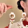 Pendientes de Fuegos Artificiales de Circonita Roja de Año Nuevo para Mujer 2026 Nuevo Estilo Popular Pendientes Únicos y Hermosos