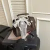 Bolsa Simples para Mulheres Nova Moda Primavera 2026 Bolsa de Ombro de Nicho para Sobraco Bolsa Pequena Quadrada Transversal de Alta Qualidade