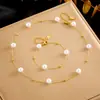 Moda europea y americana lujo ligero alto sentido temperamento cadena de perlas redondas acero inoxidable chapado en oro pulsera collar traje