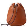 2026 Nova Carteira de Moedas de Couro Genuíno Masculina Retrô Antiga Bolsa com Cordão Couro Bovino Camada Superior Bolsa de Armazenamento de Joias com Cordão Atacado