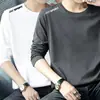 Camiseta casual versátil de manga larga para hombre para otoño, cuello redondo, color liso moderno, cómoda, transpirable y de corte holgado.