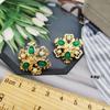 Pendientes de aleación electrochapados verdes pendientes de gota esmalte personalidad de moda clip para oreja corto pendiente de resina para oreja colgante fabricantes