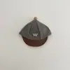 Gorra de béisbol infantil de ala suave, sombrero de rayas versátil de moda ins estilo coreano para niños pequeños, sombrero de sol para bebé, producto de nicho transfronterizo