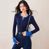 2025 primavera nuevo coreano falso de dos piezas color solapa simple jersey cuello redondo corte ajustado costuras suéter de manga larga para mujer