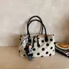 Bolso de lona con lunares súper popular para mujer, nuevo 2026 moda coreana de nicho de moda, bolso grande de capacidad para el hombro