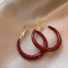 Aretes Cúbicos de Perla Roja de Año Nuevo para Mujer, un Estilo Versátil y Popular para su Año Zodiacal, con un Toque de Alta Gama y Lujo