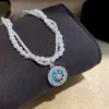 Collar con colgante de calabaza con incrustaciones de circonita y técnica de goteo de aceite para otoño e invierno, sensación de lujo ligero y alta gama, cadena para la clavícula, joyería versátil de nicho para el día a día de las mujeres