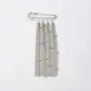Colgante de borla con cadena de estrellas plateadas estilo europeo y americano, pasador anti-exposición para trajes, accesorio de modificación para el dobladillo de jeans