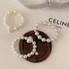 Pulsera de doble propósito ~ banda de goma de perlas de alta gama para el cabello de mujer, cuerda para la cabeza de alta elasticidad, duradera, nueva de alta gama 2025