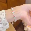 Pulsera geométrica redonda de circón chapada en oro real para mujer, de lujo ligero, alta gama, versátil, elegante y exquisita joyería