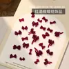 Accesorios Populares para Uñas con Forma de Moño Resina Borgoña Cinta Flujo Mini Pajarita Estéreo Accesorios para Uñas Venta al por Mayor