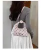 Bolso de lunares de nicho súper popular para mujer en otoño e invierno de 2026, nuevo bolso cruzado versátil de moda, bolso de mano pequeño exquisito