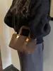 Bolsa de Mão Transfronteiriça de Lã de Cordeiro Outono para Mulheres 2025 Novo Estilo da Moda Bolsa de Ombro Bolsa Transversal Tendência de Nicho