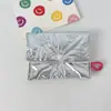 Bolsa de Monedas Plegable con Lazo de Corazón de PU Brillante Portátil Tarjetero Rellena de Algodón Acolchada Bolsa de Mano para Toallas Sanitarias