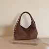 Estilo coreano de nicho transfronterizo con remaches, estilo motocicleta, bolsa tipo dumpling para mujer, 2026, nueva, gran capacidad, para el trabajo, de un solo hombro, bajo el brazo