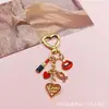 Llavero personalizado estilo europeo y americano transfronterizo colgante para bolsa de teléfono móvil Día de San Valentín rojo colgante de lápiz labial rosa mujer