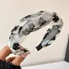 2025 Elegante Temperamento Top Alto Caveira Faz Rosto Menor Faixa de Cabelo Moda Feminina Aba Larga Pressiona Cabelo Acessório de Cabeça Redutor de Idade Estiloso Aro de Cabelo