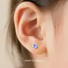 Pendiente de aleación de titanio F136 con diseño de ojo de ángel, engaste de garra en forma de copa, stud para labio de zirconia 5A, cabeza de joyería G23 de titanio con rosca de 0.9 mm